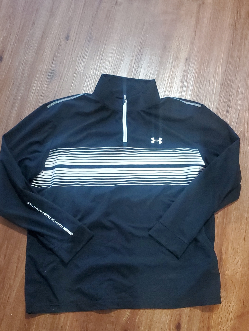 Under Armour Cold Gear Black Long Sleeve 1/4 Zip with White Stripes and Logo arm